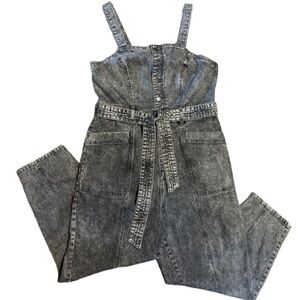 Denim overalls in a gray acid wash